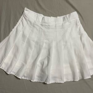white pleated mini skirt